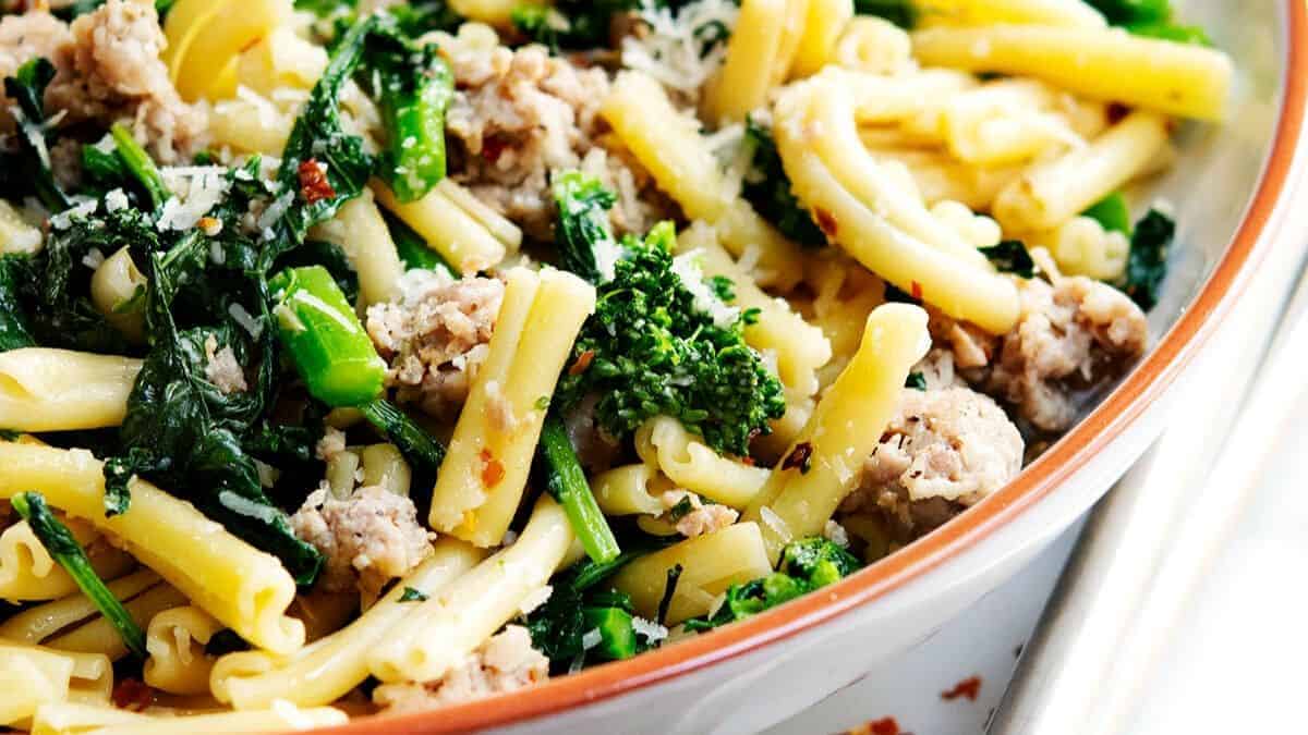 broccoli rabe and sausage pasta ready to serve