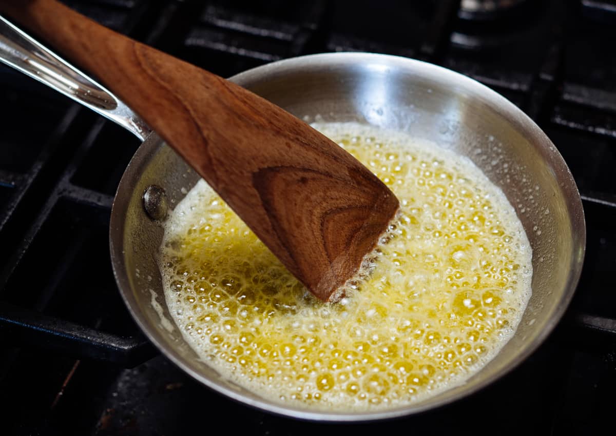 butter sizzling in a skillet.