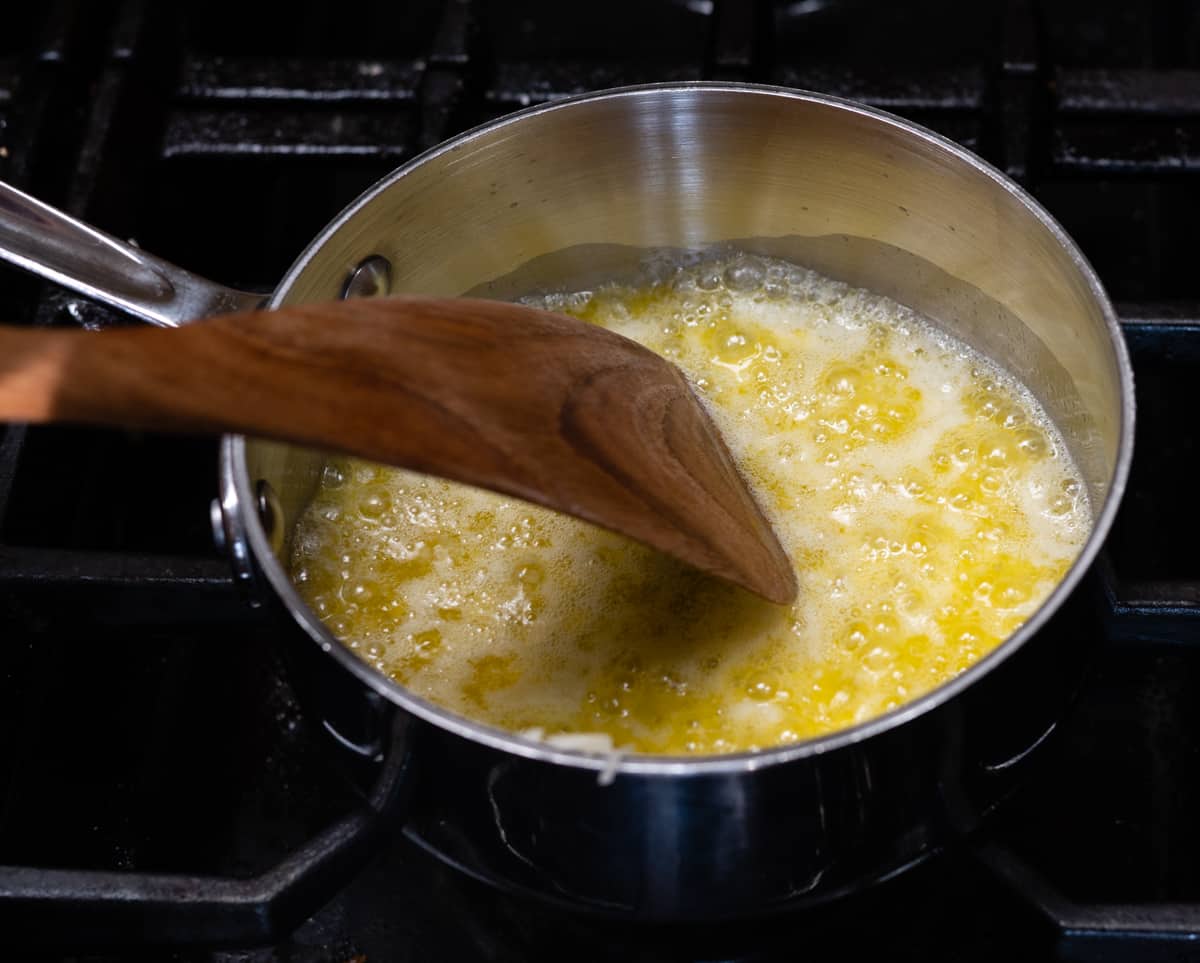 cooking garlic in butter in a small saucepan.