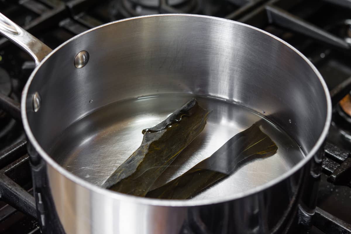 dried kombu and water in saucepan.