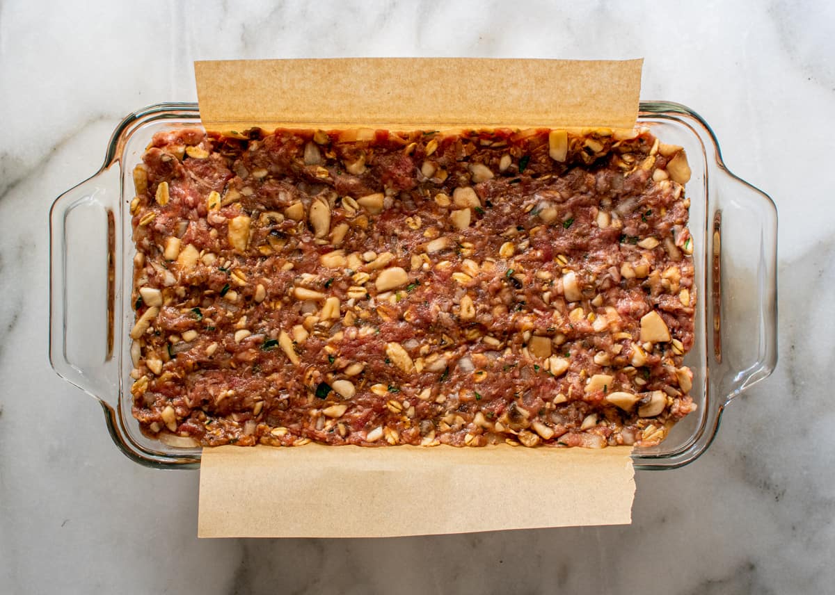 meatloaf mixture in glass loaf pan