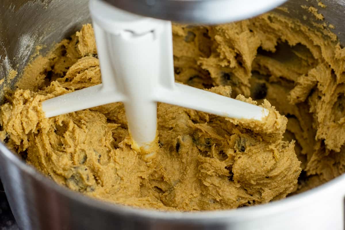 oat flour chocolate chip cookie dough in mixing bowl.