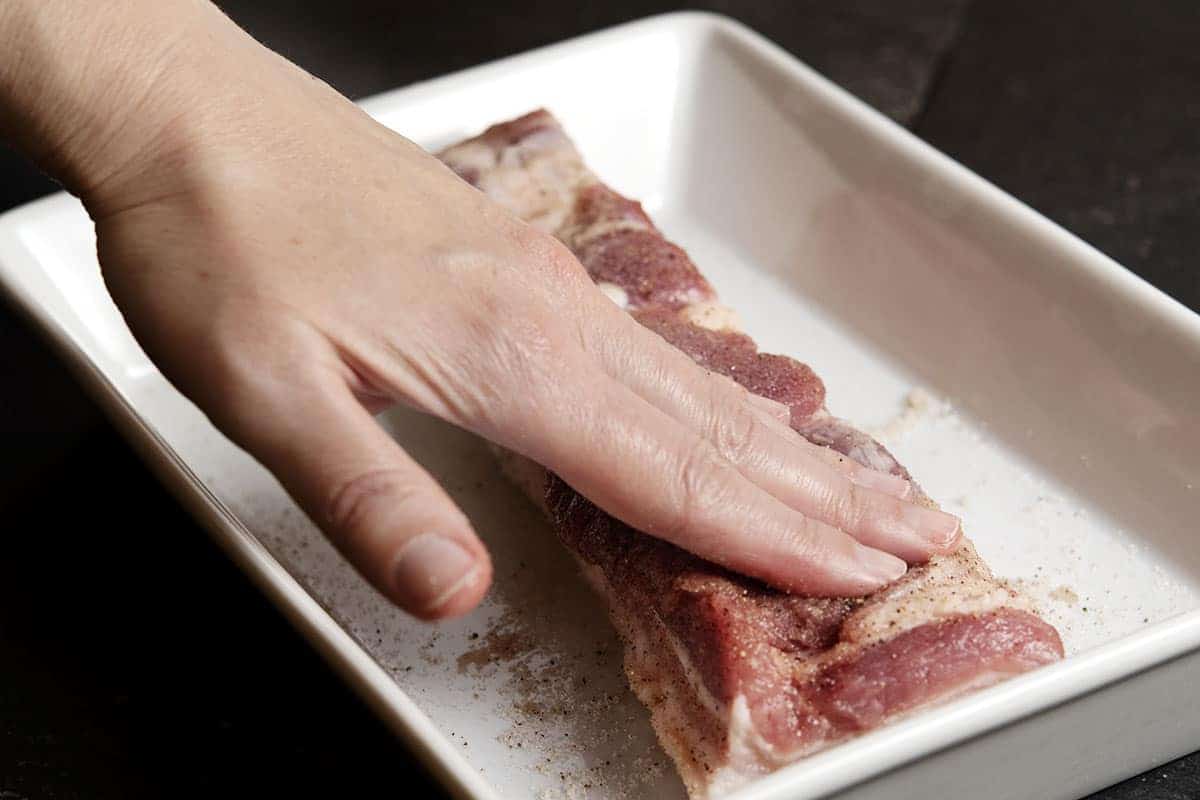 seasoning underside of pork belly