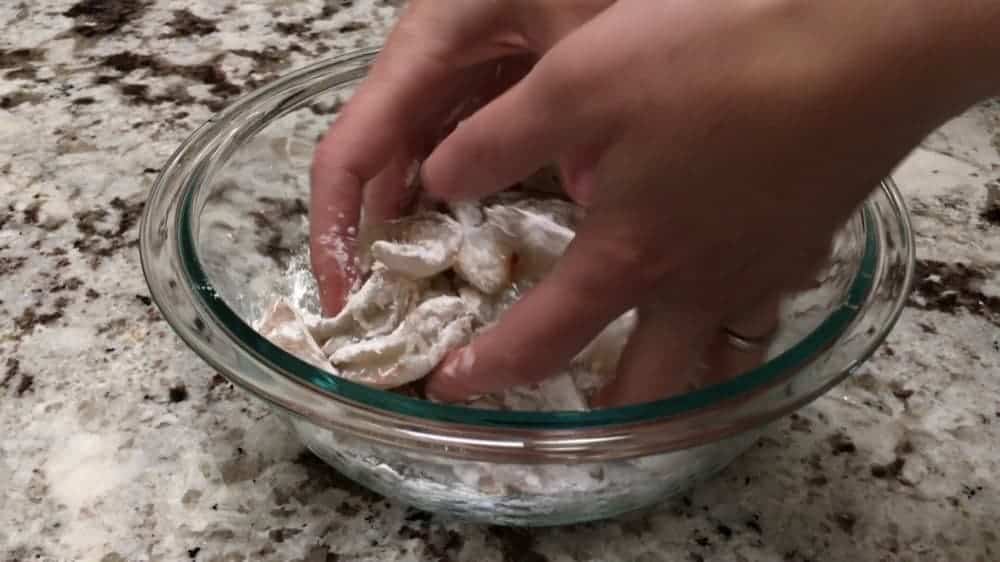 tossing shrimp in cornstarch